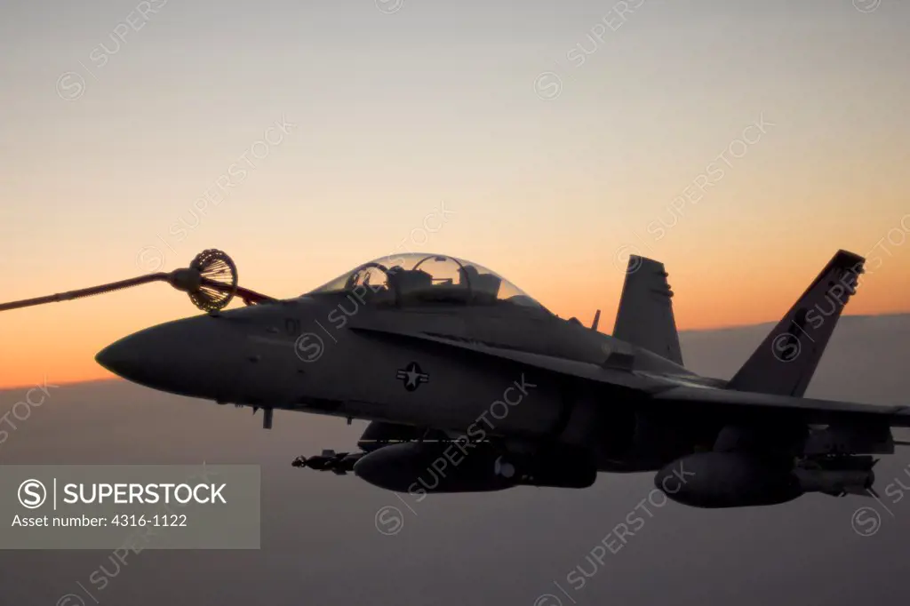 A View of a US Marine Corps F/A-18D Hornet During Mid-Air Refueling Miles Above the Al Anbar Province of Iraq