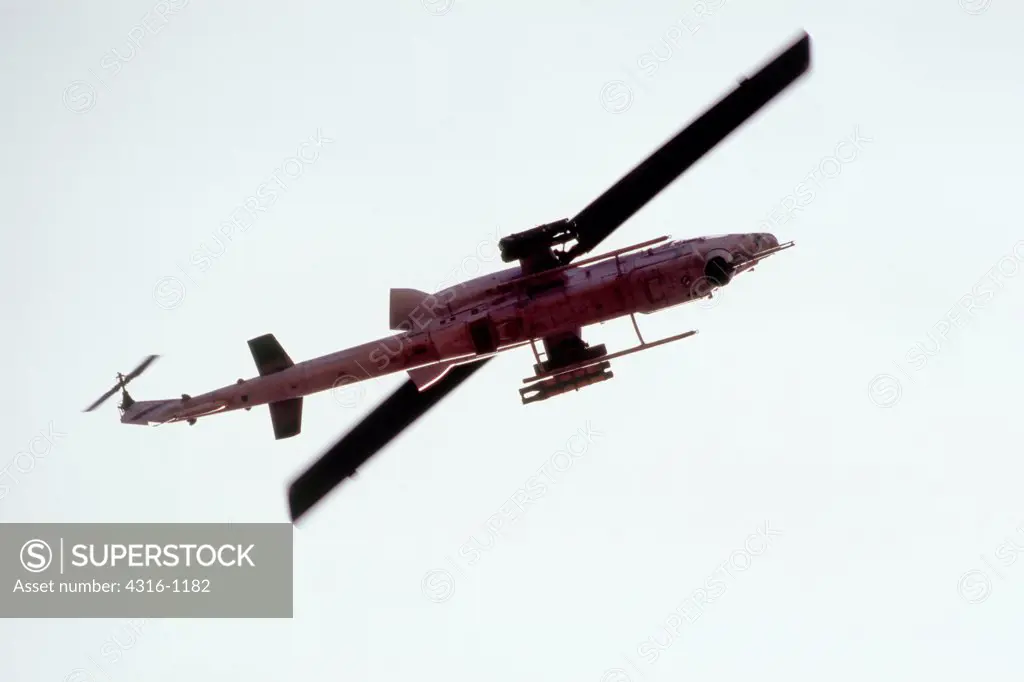 View from Below of a US Marine Corps AH-1W Super Cobra During a Close Air Support Mission Over Barwana, Iraq