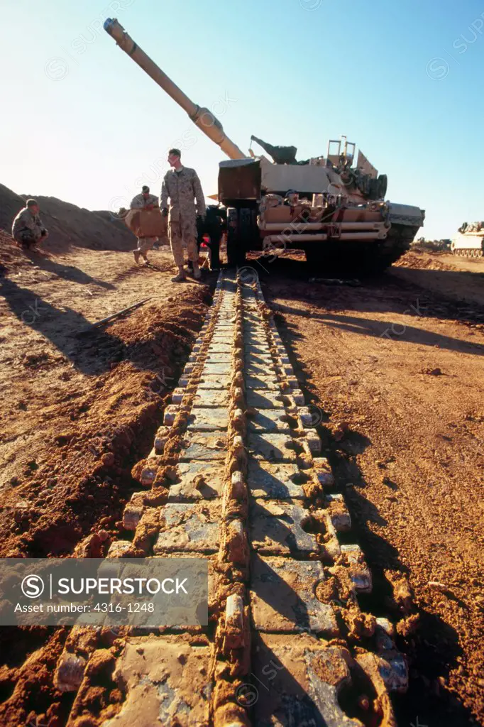 US Marines Fix a Damaged Link on a Track of an M1-A1 Abrams Tank at Camp Bastard, Near Haqlaniyah, Iraq