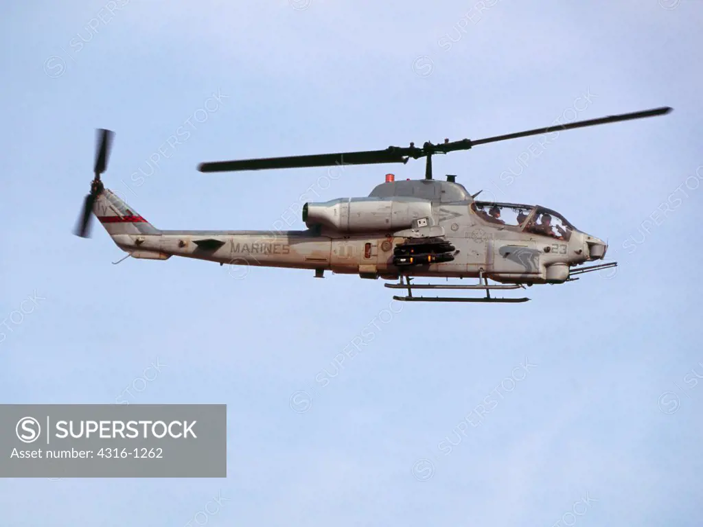 A US Marine Corps AH-1W Super Cobra Flies A Close Air Support Mission Over Barwana, Iraq