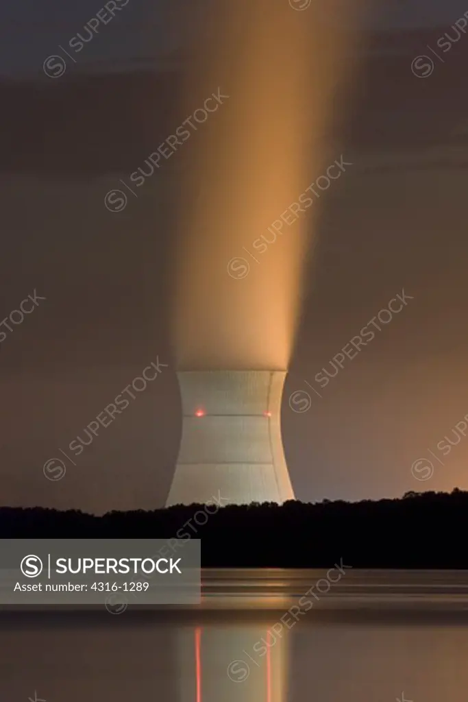 Nightime View of a Nuclear Power Plant's Cooling Tower