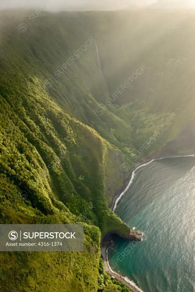 Late Afternoon Aerial View of the Sea Cliffs of the North Shore of the Hawaiian Island of Molokai, the Highest Sea Cliffs in the World