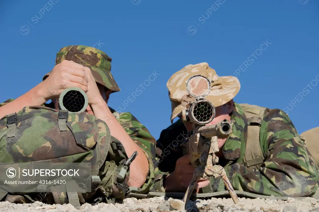 British Royal Marine Commando Snipers Take Aim