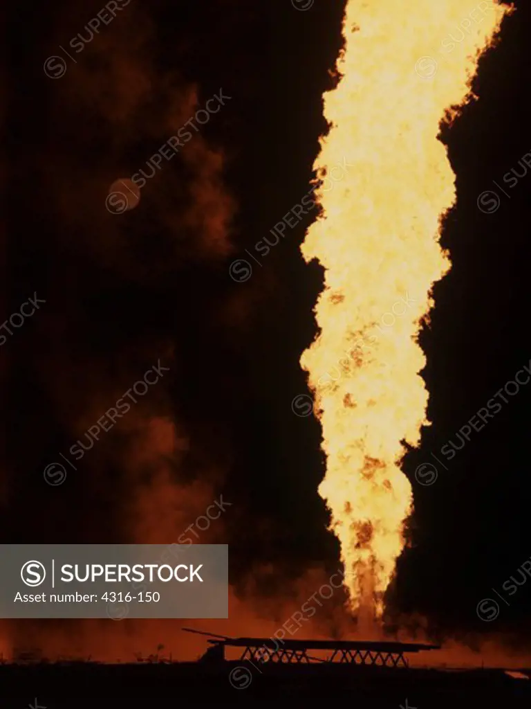 A Natural Gas Inferno and Blood-Red Full Moon