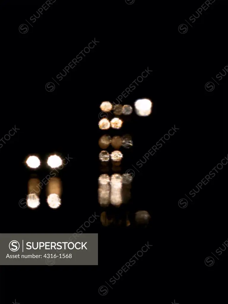 Headlights at Night in an Inferior Mirage Near Marfa, Texas