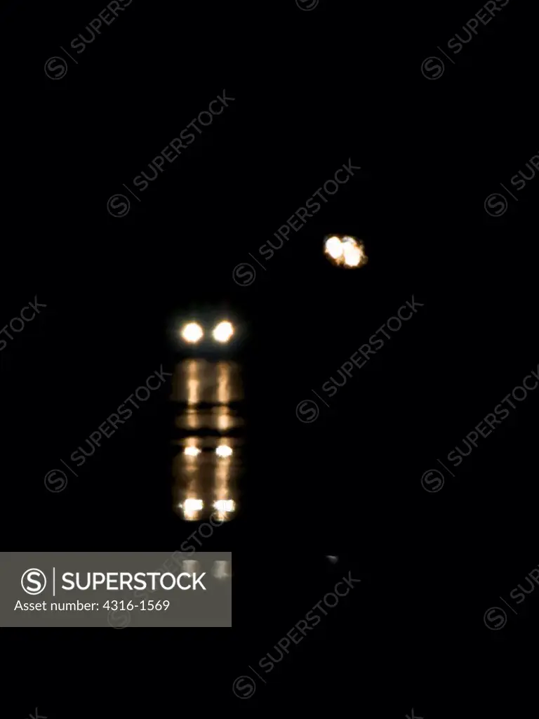 Headlights at Night in an Inferior Mirage Near Marfa, Texas