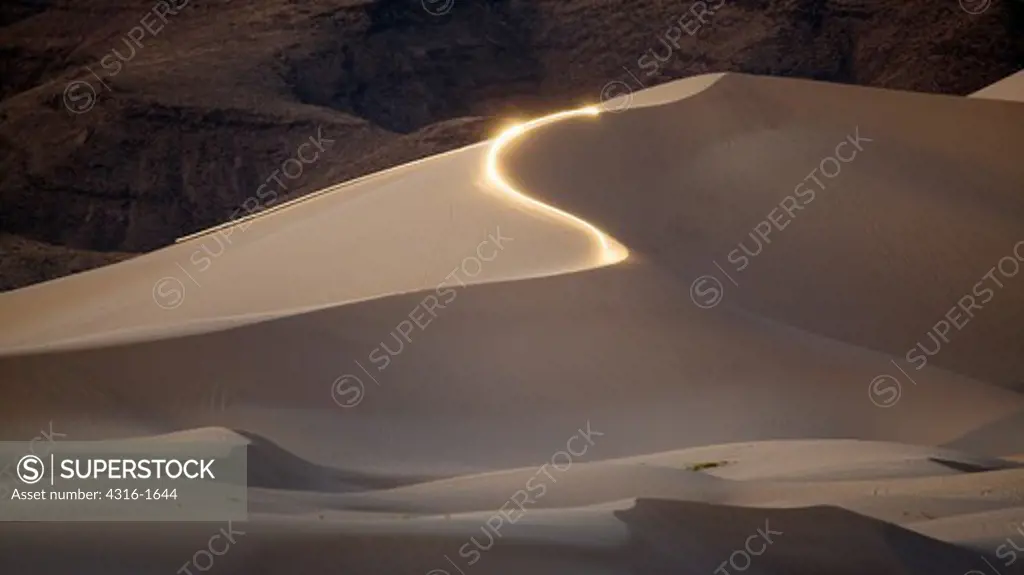 Streak of Light at Crest of Dune