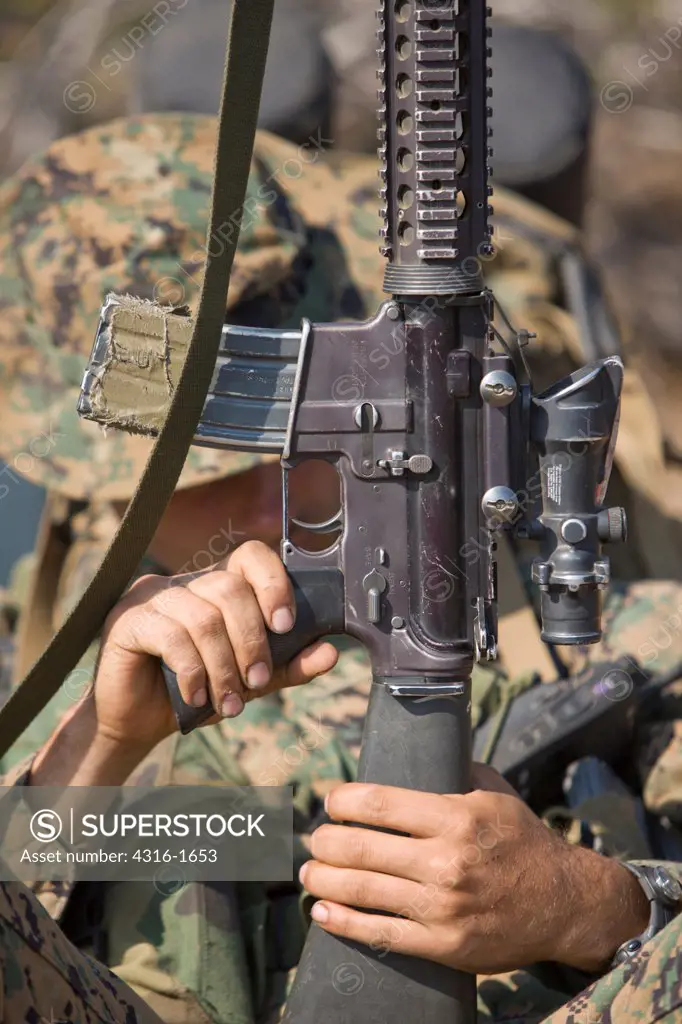 U.S. Marine Holding His M16 Service Rifle