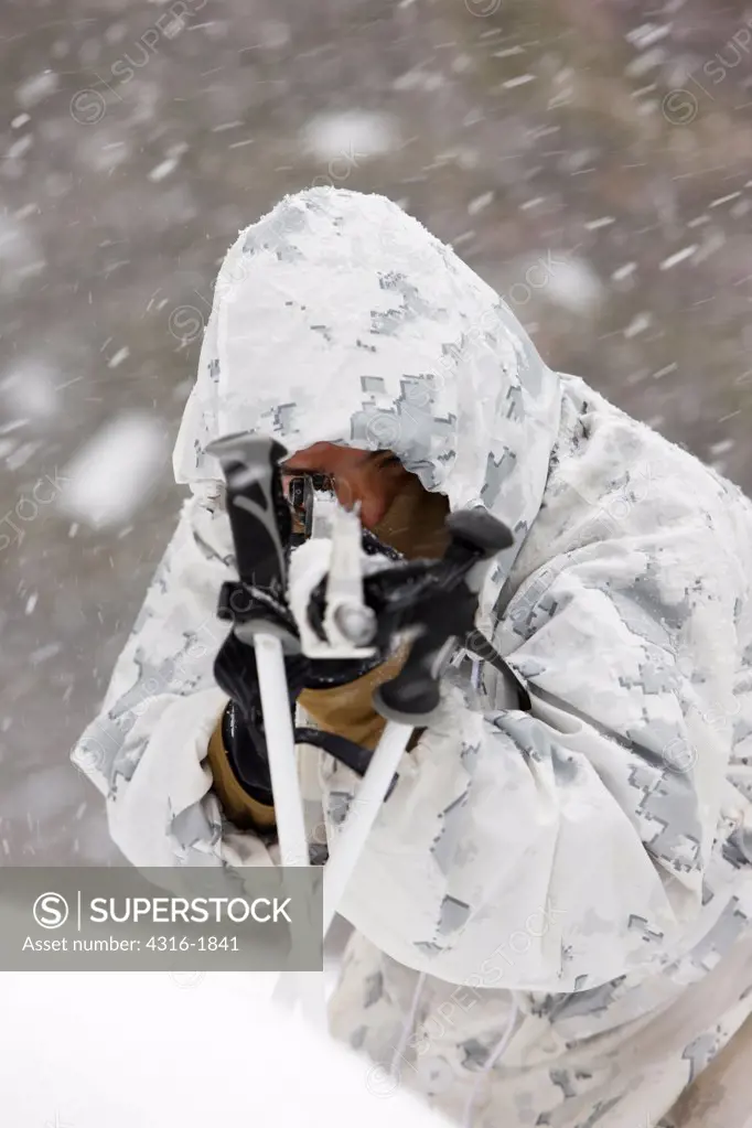 A U.S. Marine Takes Aim in a Winter Blizzard