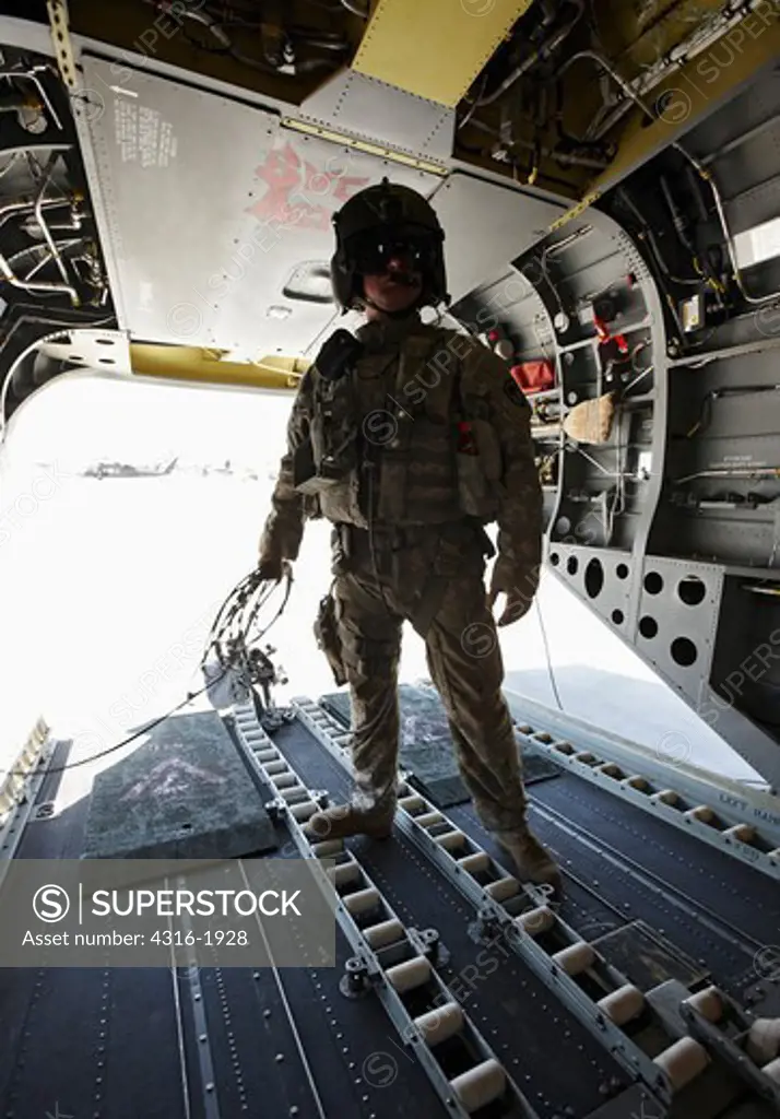 Crew Chief in the Tail Section of a CH-47 Chinook