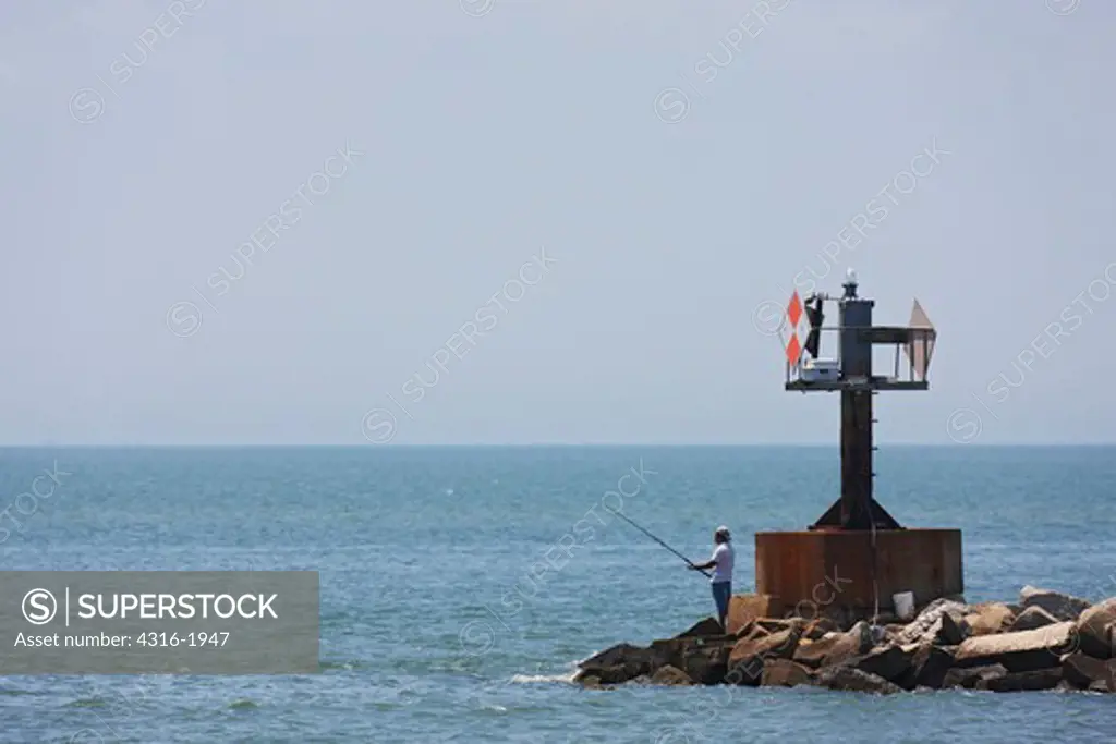 Fisherman Casts Into Chesapeake Bay