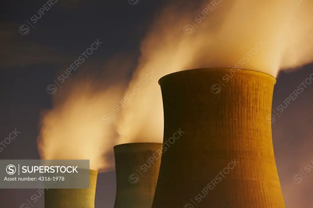 Cooling Towers Spewing Steam.