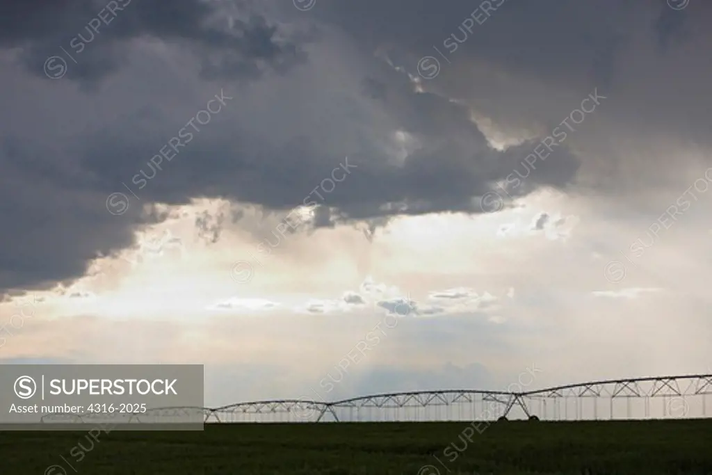 Storm Clouds and Irrigation System