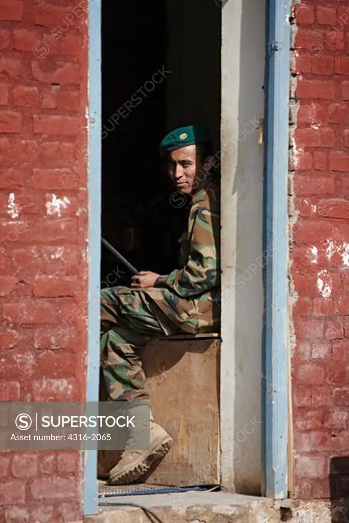 Afghan National Army Soldier in Doorway