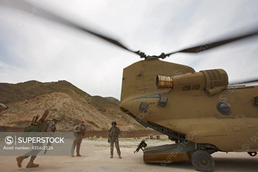 Soldiers Board an Army CH-47 Chinook