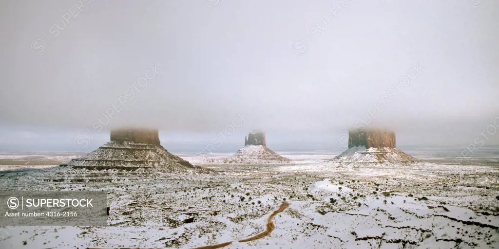 Winter Fog Visually Truncates the Mitten Buttes of Monument Valley