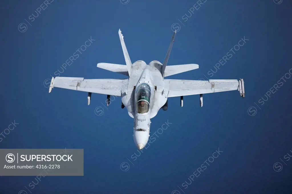 An aerial view of a United States Marine Corps F/A-18D Hornet above the South China Sea, Malaysia.