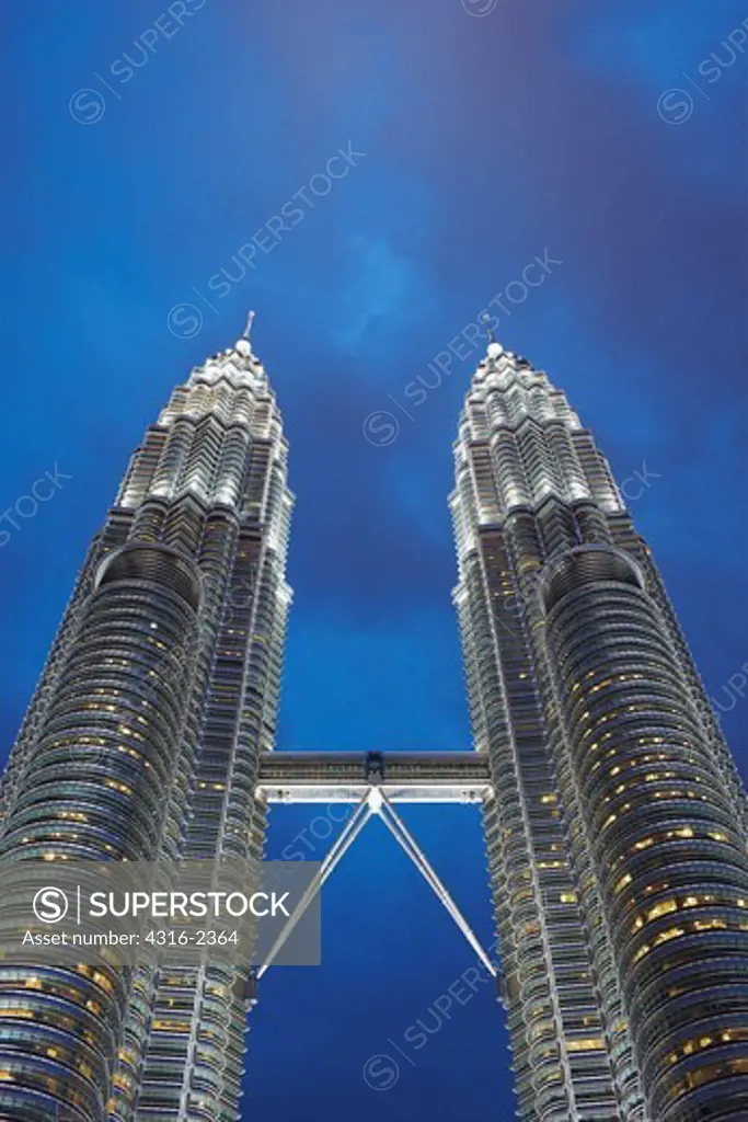 The Petronas Towers, once the highest buildings in the world at 1,483 feet high, were eclipsed in height by Taipei 101, in Taiwan. As of the date of this photograph, the Petronas are the highest twin towers in the world.