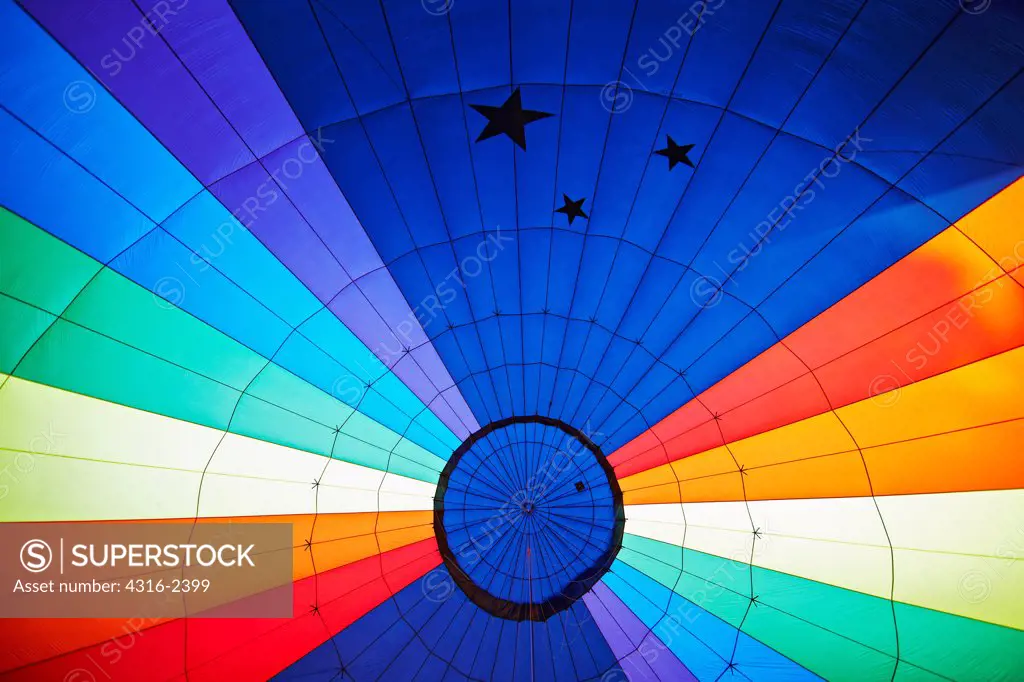 The view inside a hot air balloon during the initial stage of inflation, where a high powered fan pushes unheated air into the balloon envelope.