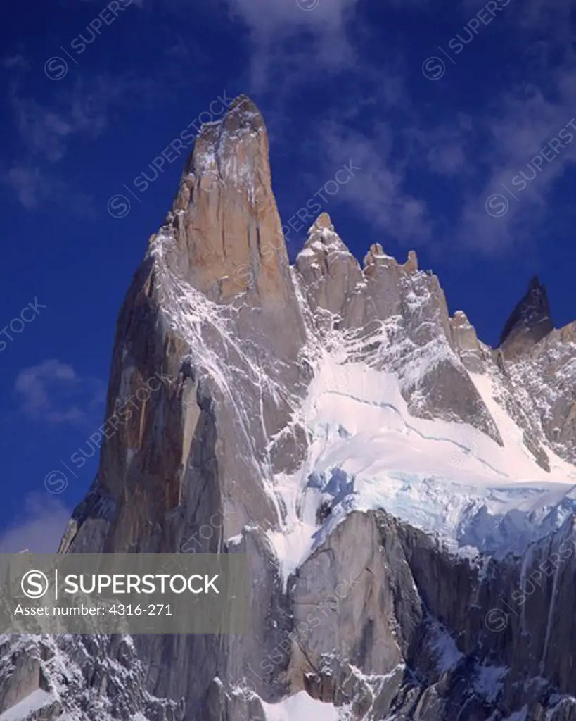 The Sheer Cerro Poincenot Thrusts Into the Cobalt Blue Patagonian Sky