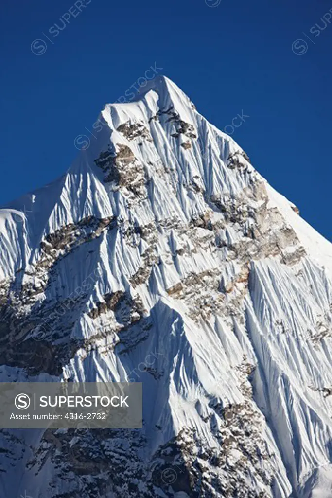 Telephoto view of the west side of Ama Dablam, which lies in the Mount Everest region of Nepal.