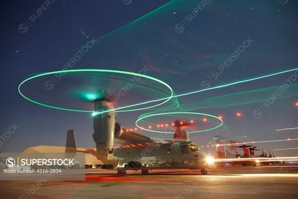 Nighttime view of a U.S. Marine Corps MV-22 Osprey taxiing out to launch at Camp Bastion, Helmand Province, Afghanistan.