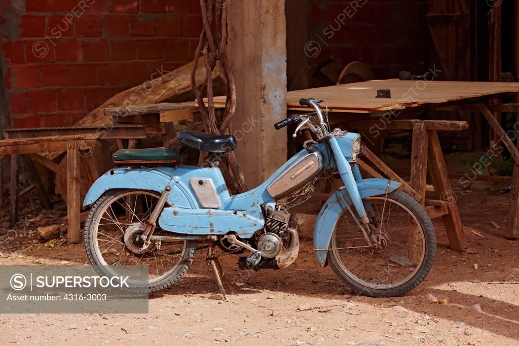A blue motorbike in Tinerhir, Morocco.