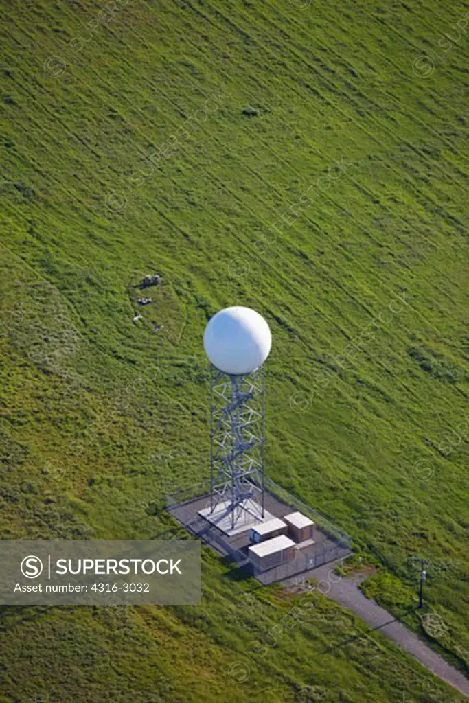 Aerial view of a National Oceanic and Atmospheric Administration (NOAA) NEXRAD (Next Generation Radar) Doppler in the Sacramento River Delta, California. NOAA operates a network of these high-resolution weather radars, which detect precipitation and atmospheric movement.