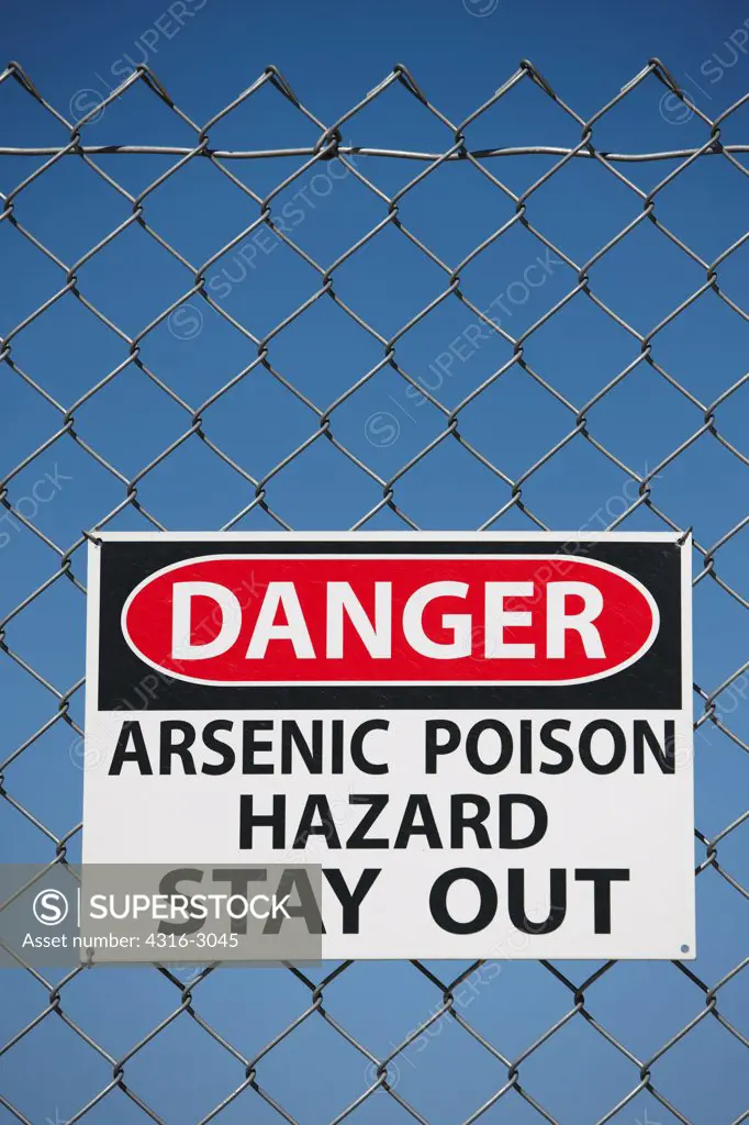 Danger sign indicating an arsenic poison hazard, Johannesburg, California.
