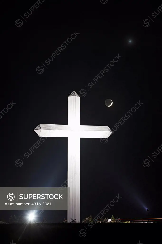 Massive crucifix, crescent moon, and Venus, in Vega, Texas.