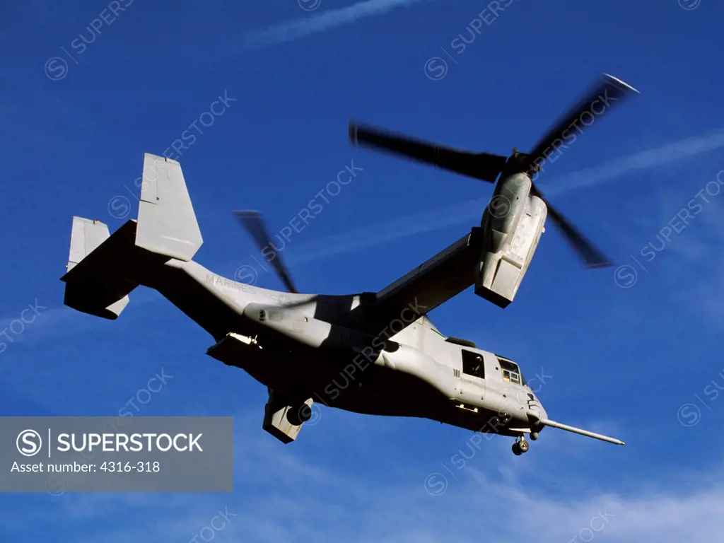 V-22 Osprey Begins Nacelle Rotation from Helicopter Mode to Airplane Mode After Launching