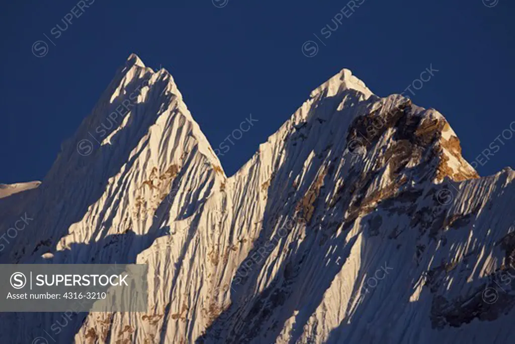 Extreme telephoto view of fluted and corniced ridges of Nuptse, Mount Everest Region, Nepal