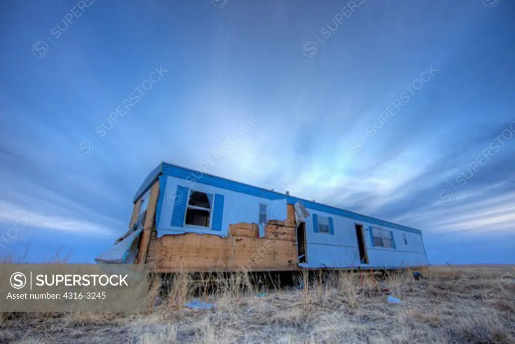 A high dynamic range, or HDR, image of an abandoned modular home on the plains of eastern Colorado.