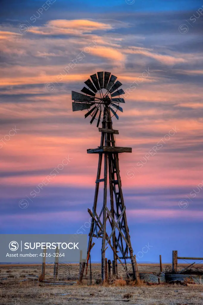 Aeromotor windmill at dusk on the eastern plains of Colorado, High Dynamic Range, or HDR Image.