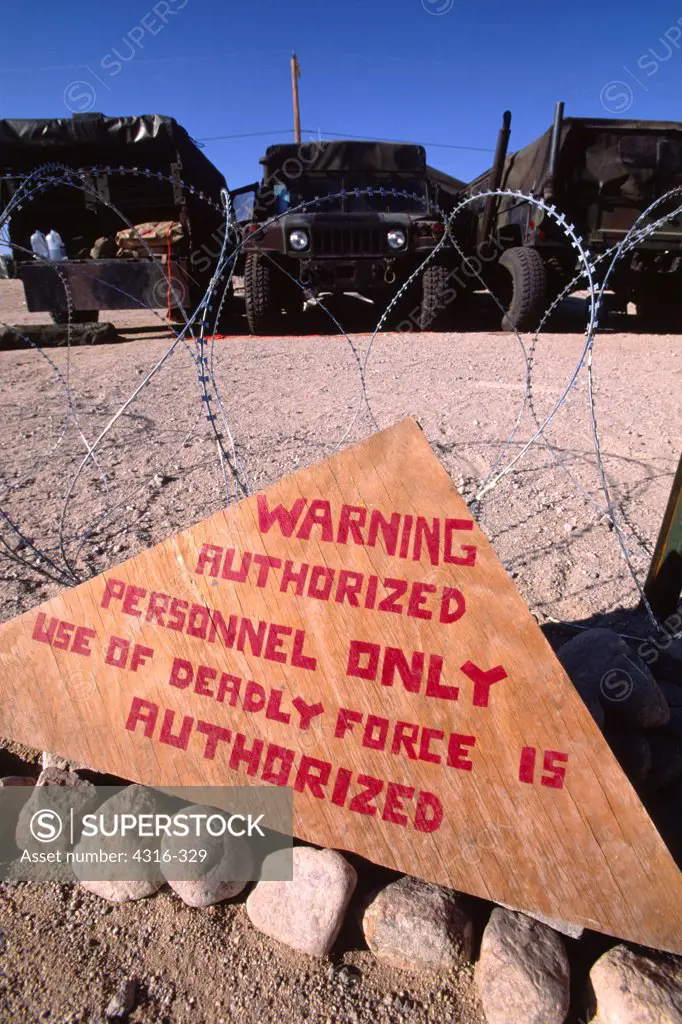 A Makeshift Warning Sign Authorizing Deadly Force