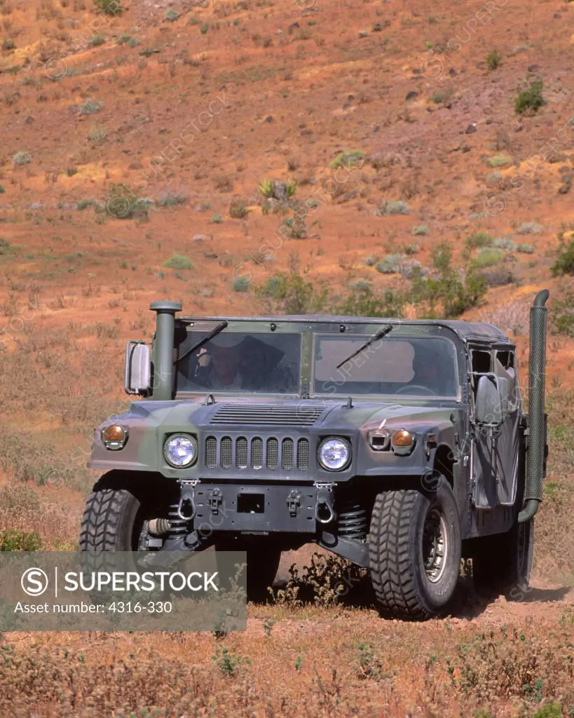 A Humvee Navigates Desert Terrain