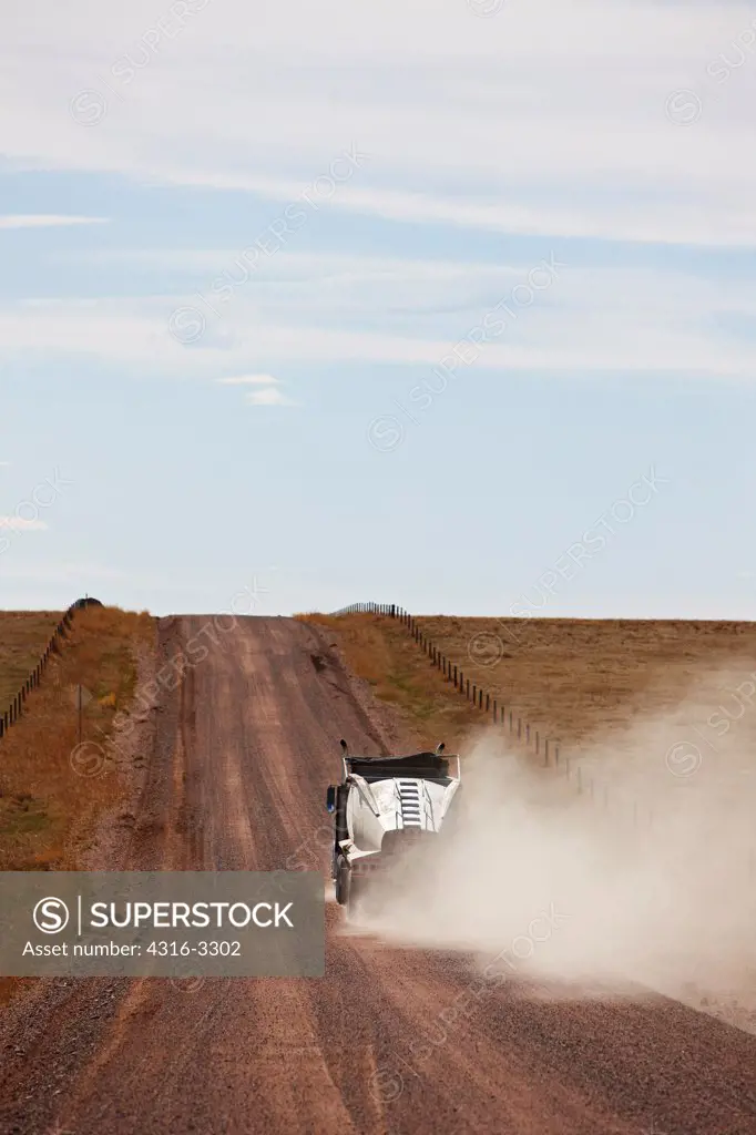 A big rig truck on Weld County Road 22 in Colorado's eastern Plains, east of Carr, Colorado, Pawnee National  Grasslands.