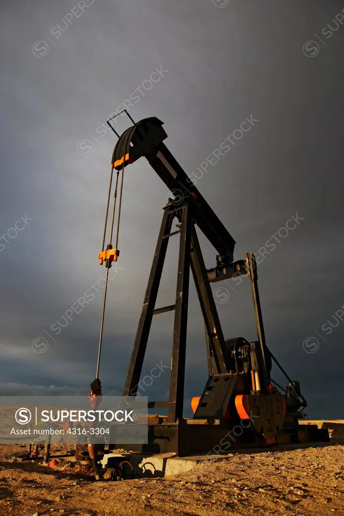 An oil  well pump jack in northeastern Colorado. A pump jack is also known as a pumpjack, a pumping unit, a grasshopper pump, and a jack pump, among other names.