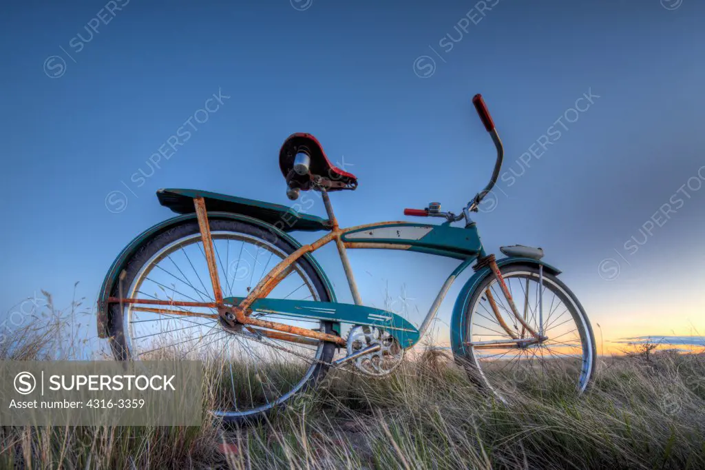 A 1950s era 'Monark Holiday' bicycle on the prairie at Buckingham, Colorado, in a High Dynamic Range, or HDR, image.
