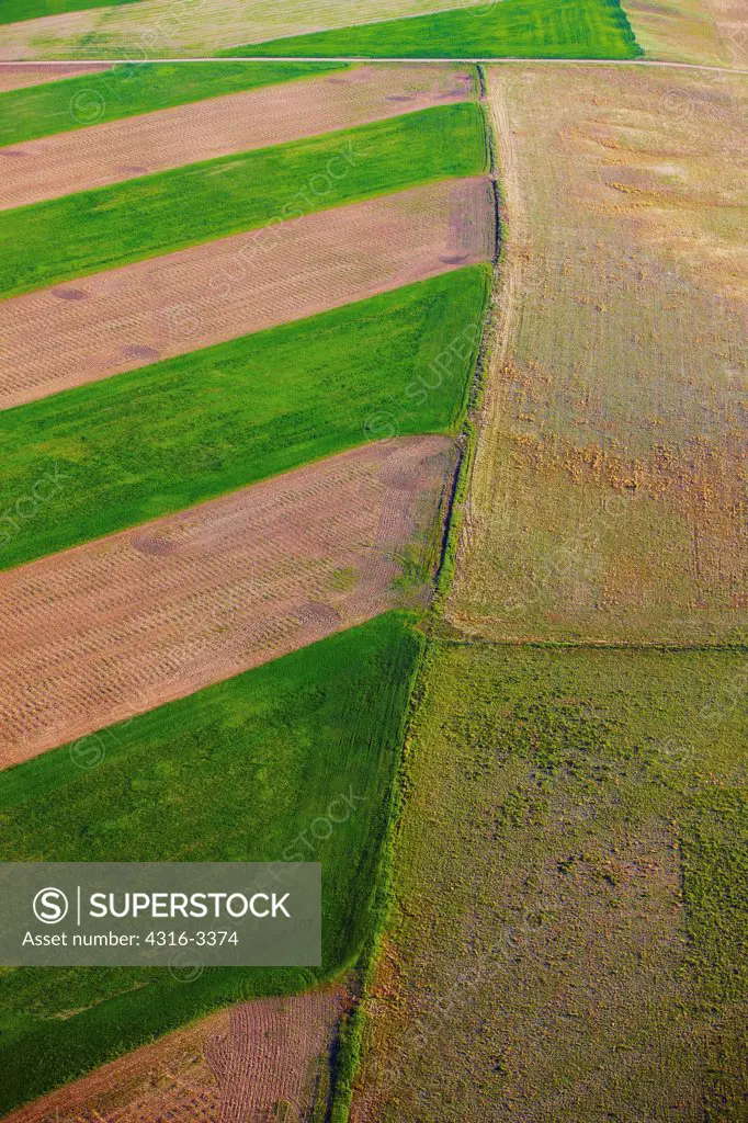 An aerial view of patchwork of fields, on the plains of eastern Colorado.
