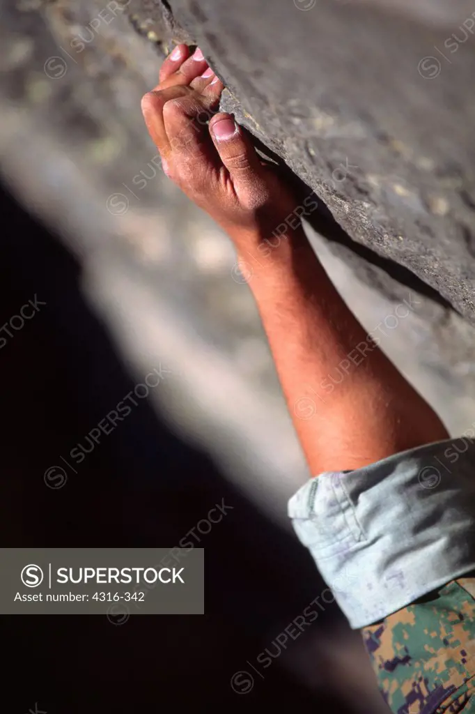 Detail of Climber's Hand on Rock