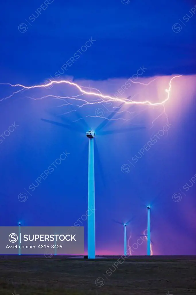 Severe thunderstorm unleashes lightning on a wind farm in Colorado.