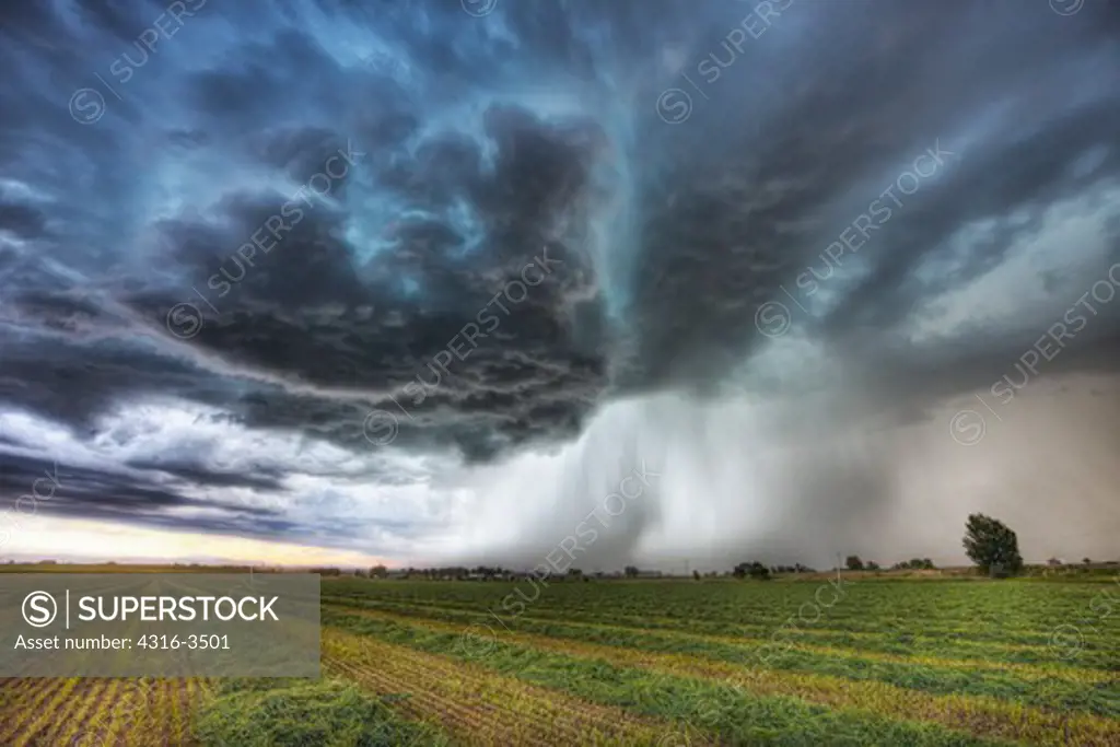 Thunderstorm over field, high dynamic range, or HDR image.