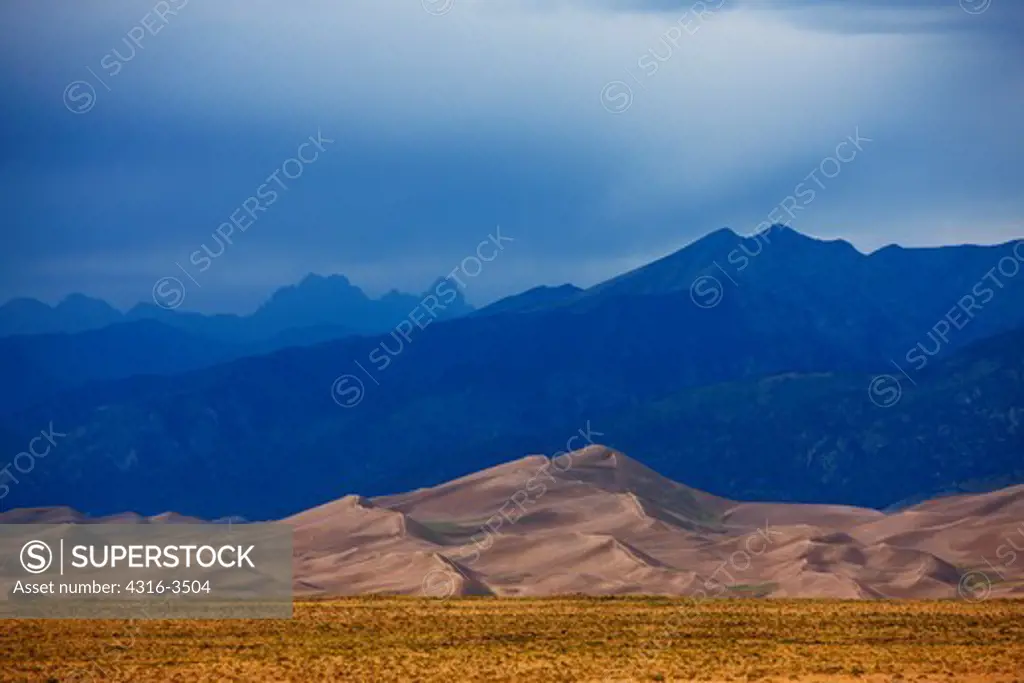 Great Sand Dunes and the Sangre de Cristo Range of peaks of Colorado's Rocky Mountains, High Dynamic Range, or HDR image.