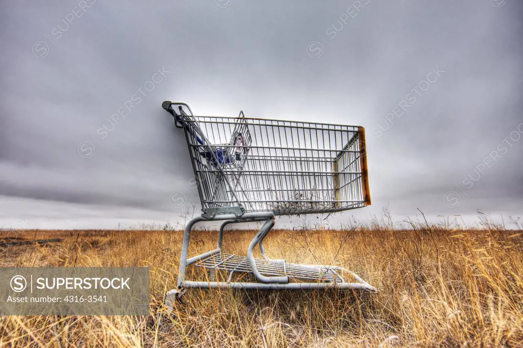 A shopping cart abandoned on the prairie of Colorado's eastern plains, High Dynamic Range, or HDR, Image.