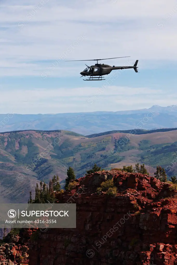 U.S. Army National Guard OH-58 Kiowa in Colorado's Rocky Mountains.