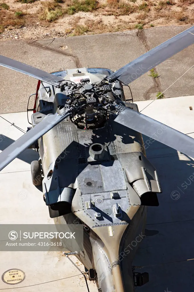 Aerial view of a Sikorsky UH-60 Blackhawk helicopter on the flight line.