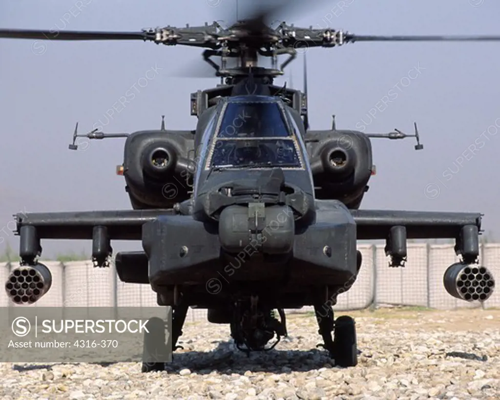 AH-64 Apache Gunship Idles on a Dirt Landing Strip at Jalalabad, Afghanistan