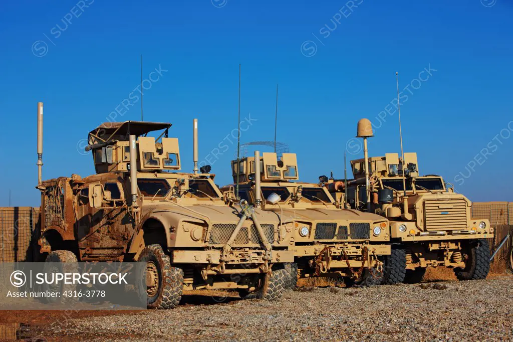 MRAPS, or Mine Resistant Ambush Protected Vehicles at a Small, Austere, Remote U.S. Marine Corps Combat Outpost in Afghanistan's Helmand Province