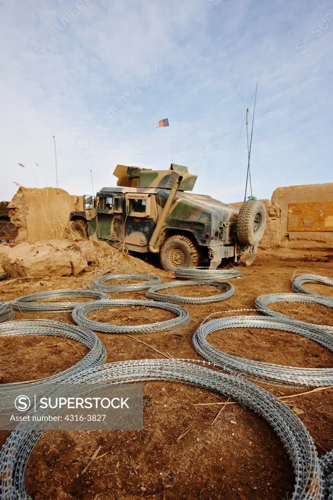Coils of Concertina Razor Wire at a Small, Austere Combat Outpost in Afghanistan's Helmand Province
